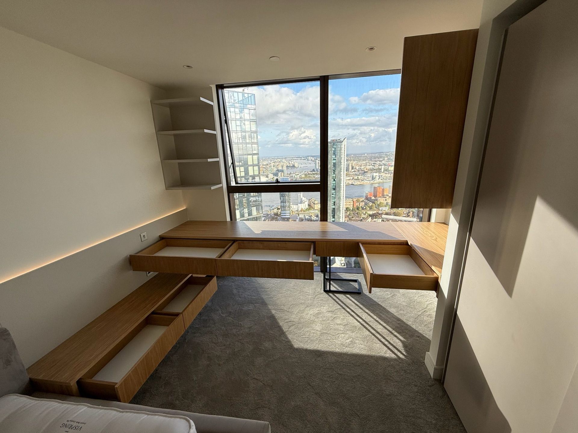 Bespoke home office desk with drawers in a high-rise apartment